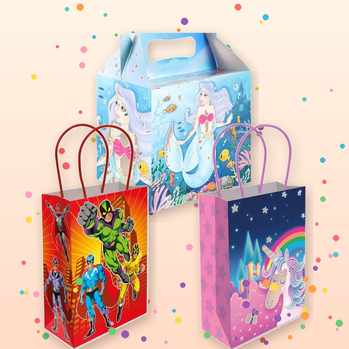 Superhero and unicorn party bags with a mermaid party box and goodies scattered around